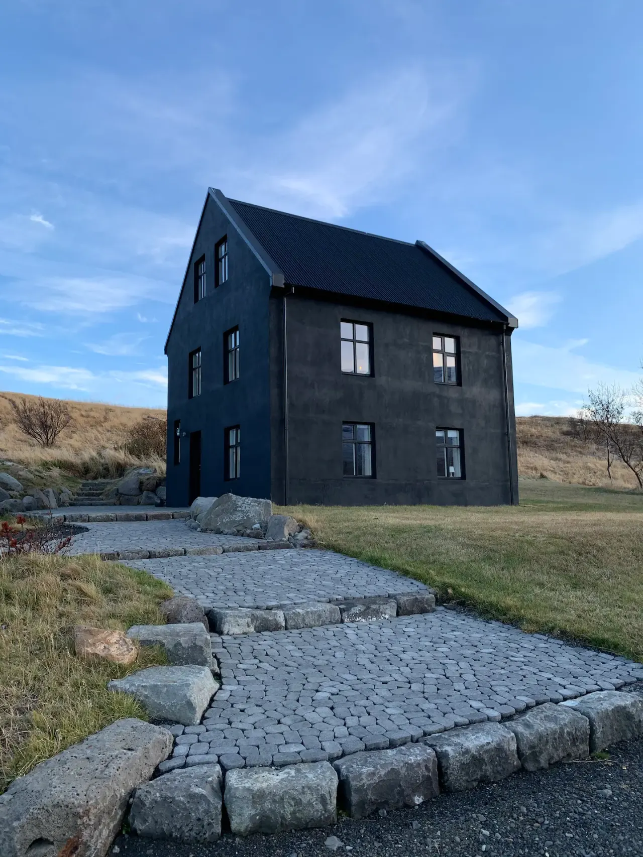 modern scandinavian farmhouse style exterior renovated farmhouse in Iceland