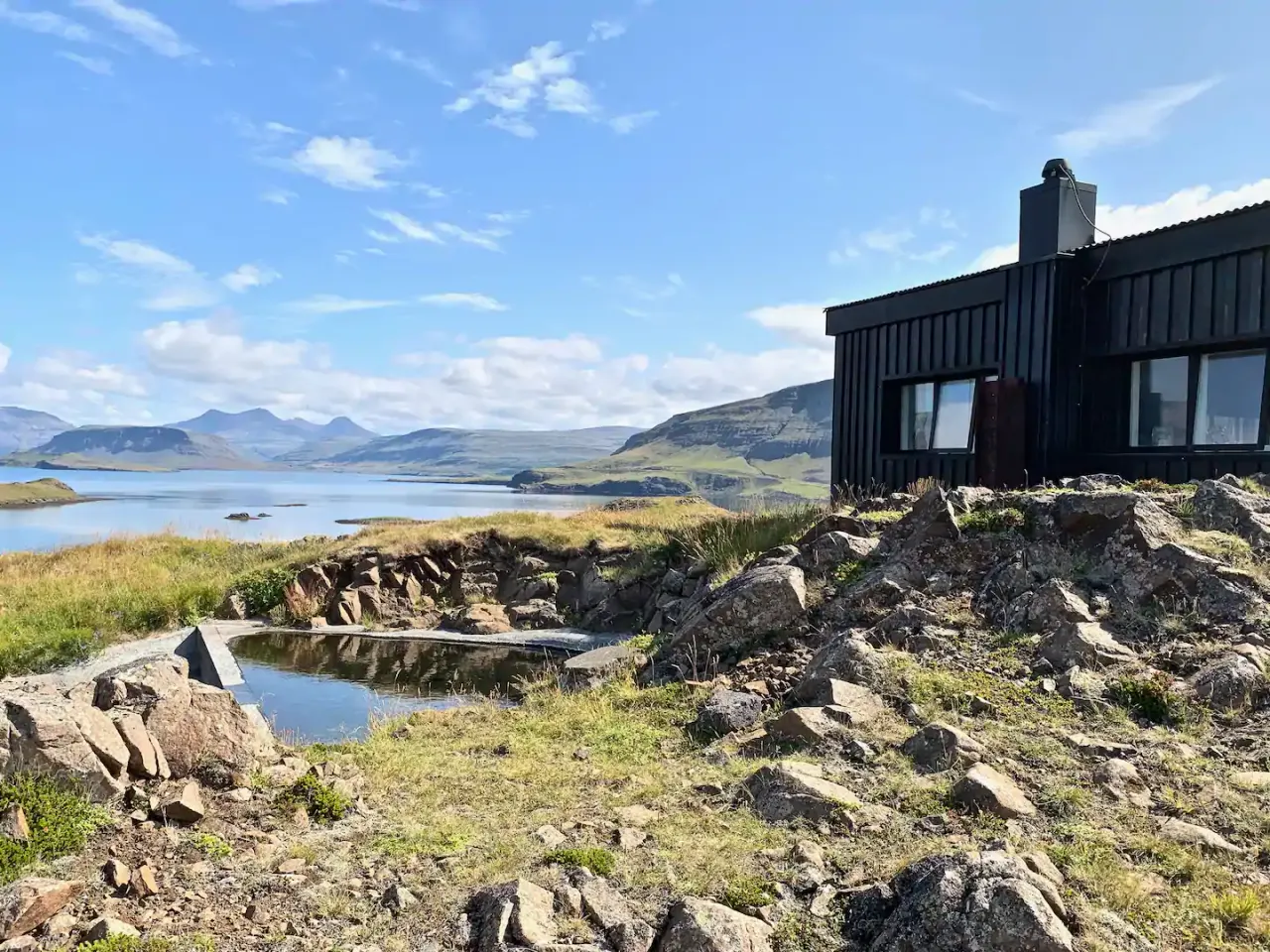 The Hilltop House Icelandic cabin with a private hot spring outside and a panoramic view