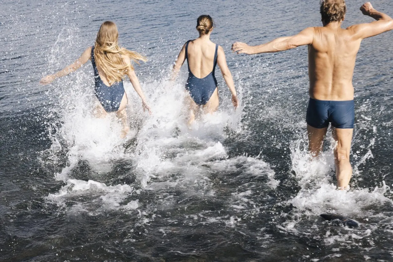 People jumping into the Atlantic Ocean