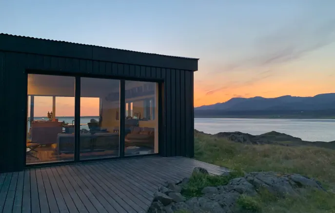 Iceland mid century lodge with view of the midnight sun