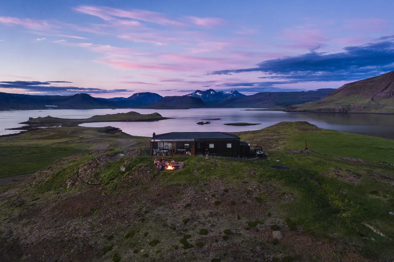 Luxury accommodation in Iceland with private hot springs views over the lagoon in Hvalfjordur