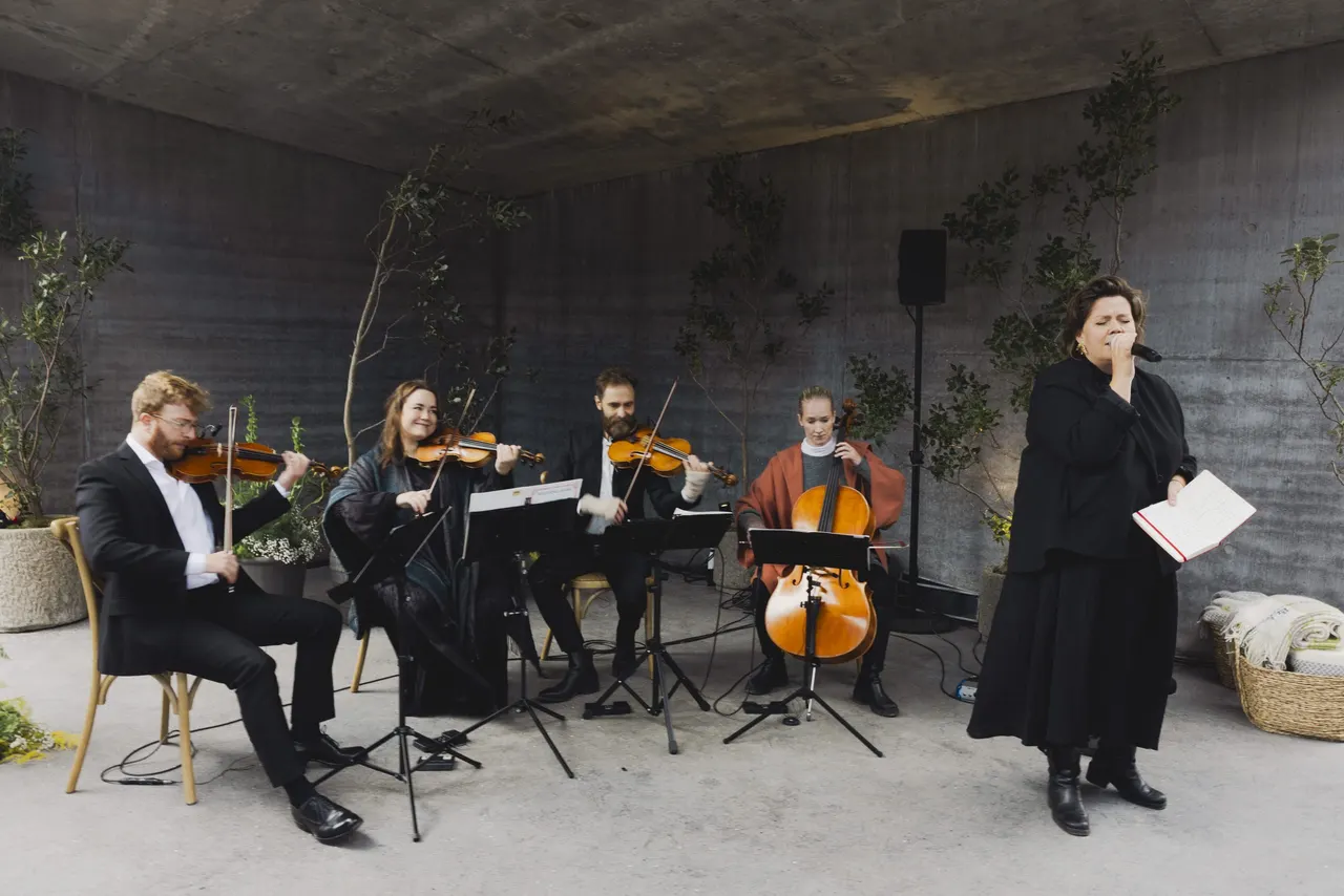 String quartet and singer performing in The Temple