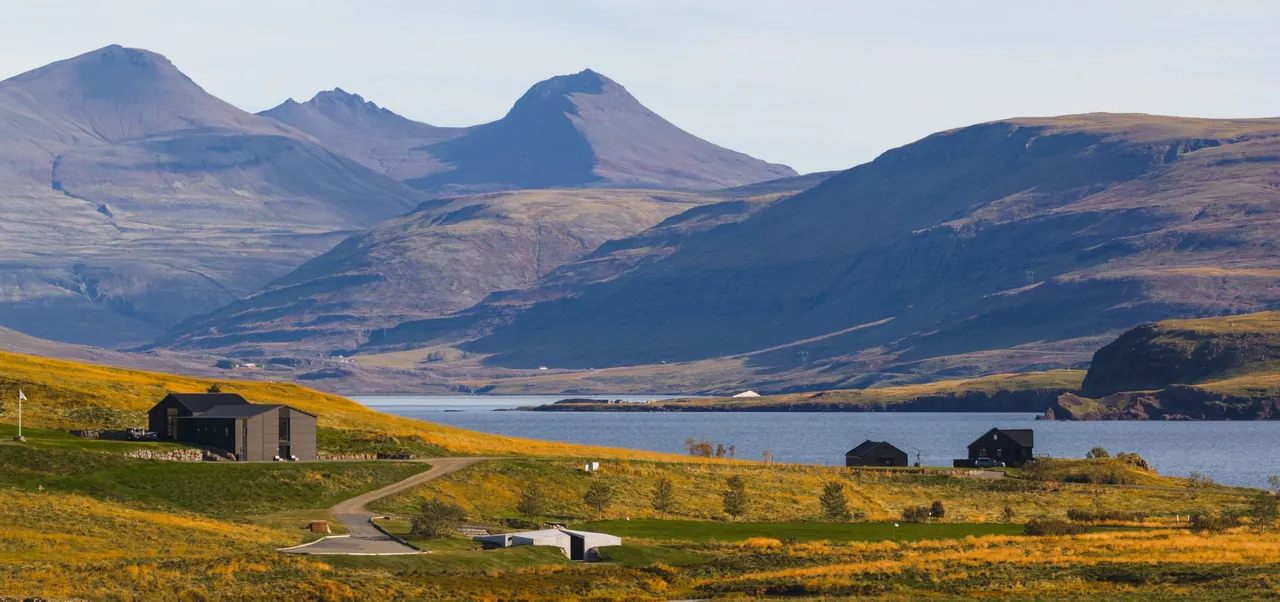 The Temple and houses at Hvammsvík below the mountains