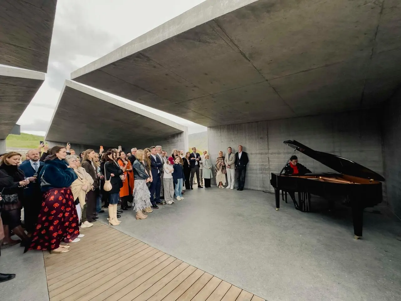 Guests at a piano concert in The Temple
