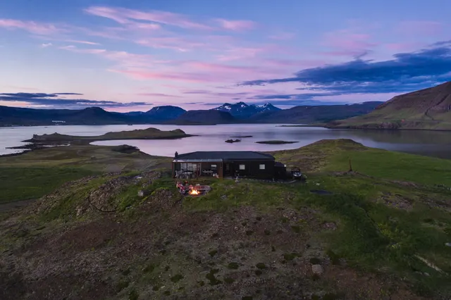 Luxury accommodation in Iceland with private hot springs views over the lagoon in Hvalfjordur