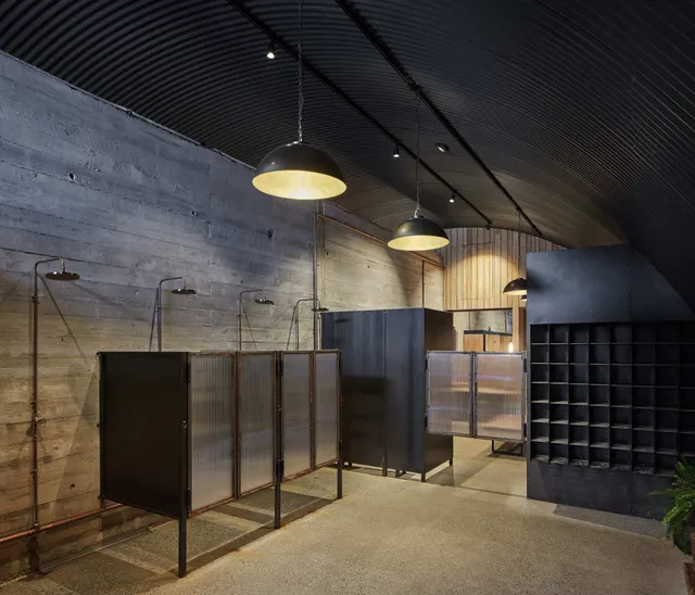 Changing rooms in bare concrete
